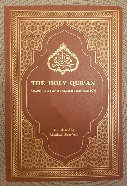 The Holy Quran Arabic with English Translation (paperback)